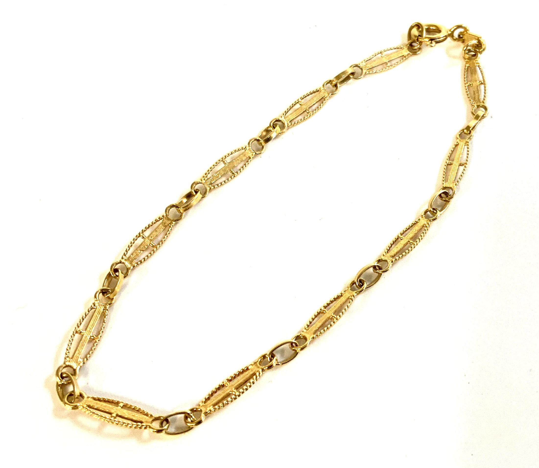 An 18ct yellow gold filigree design bracelet. (A)