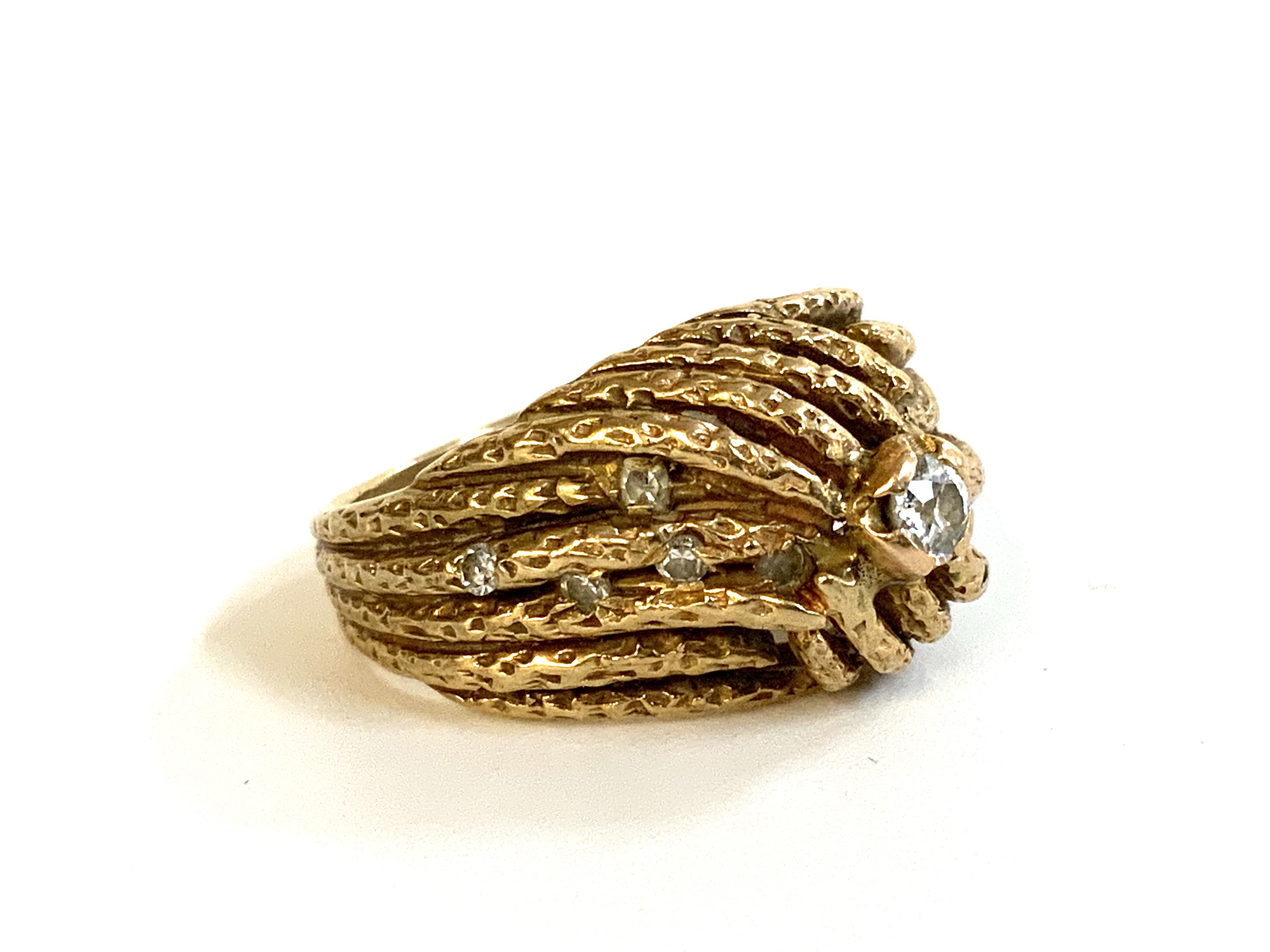 A 9ct gold weave design ring inset with a pattern of diamonds, L.5 (A)