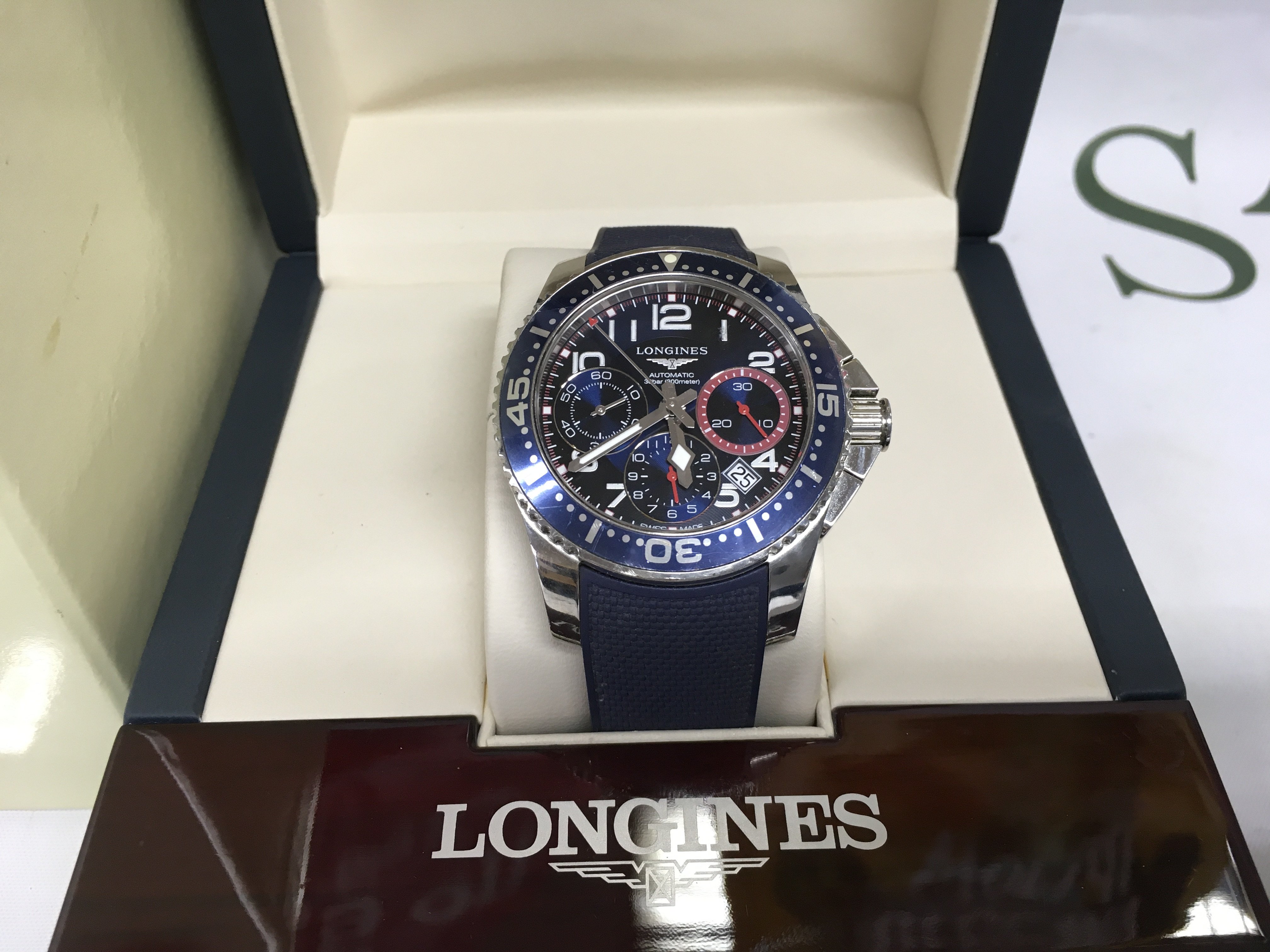 A boxed Longines automatic watch with instruction booklet. Shipping category B.