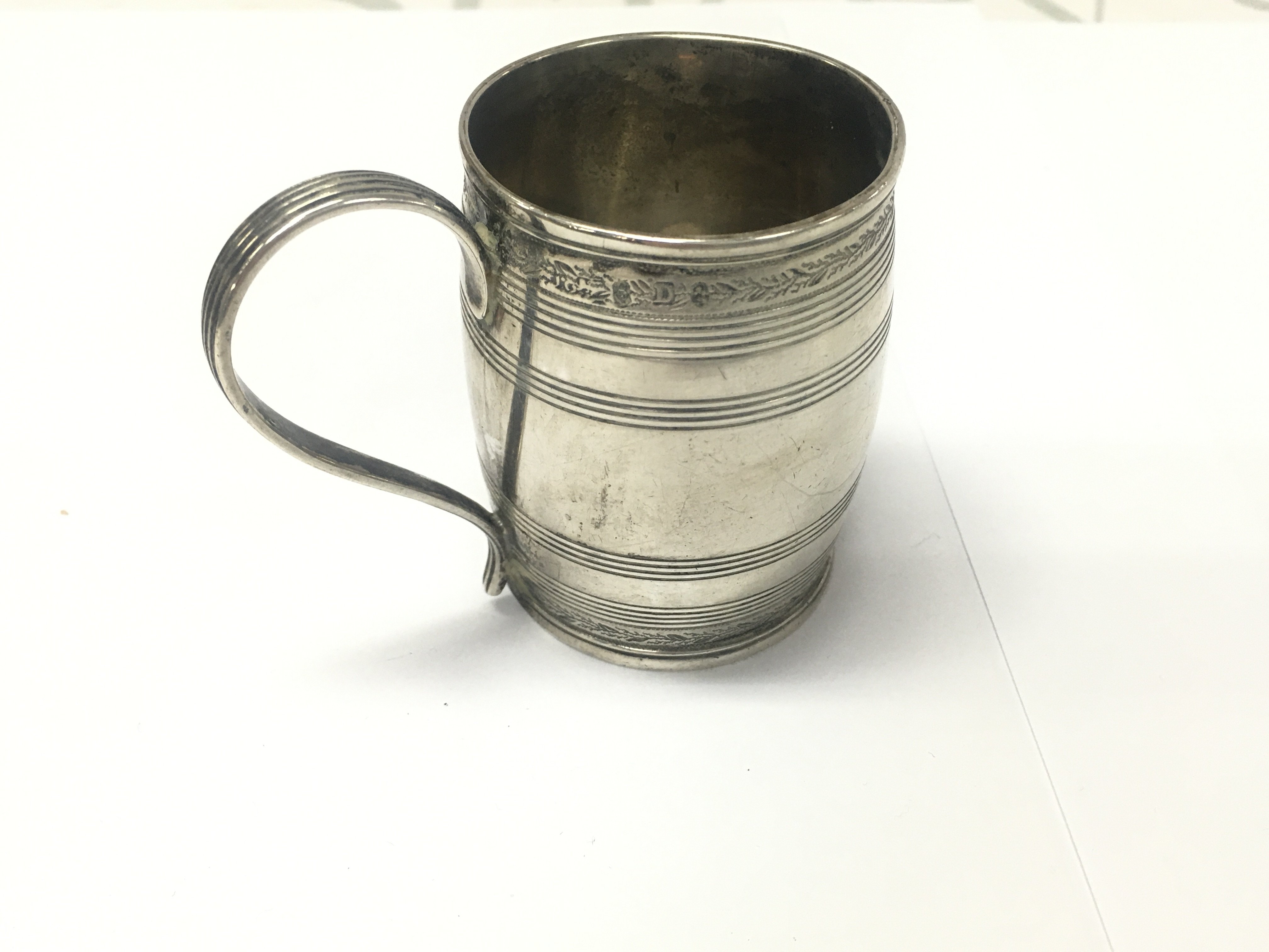 A George III silver tankard. Approximately 7cm tall. 82g