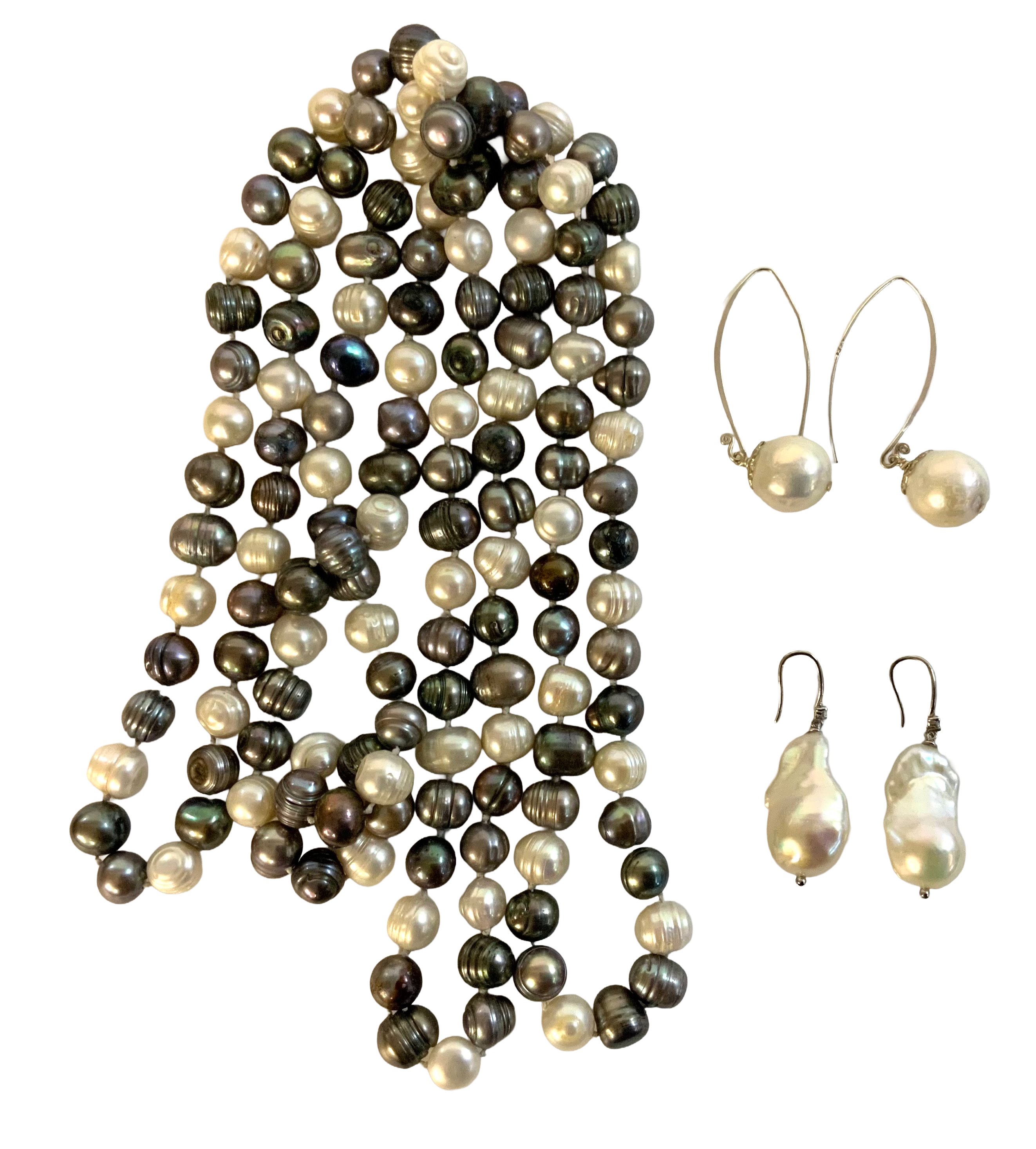 A string of blue and white baroque pearls together with 2 pairs of large baroque pearl earrings.