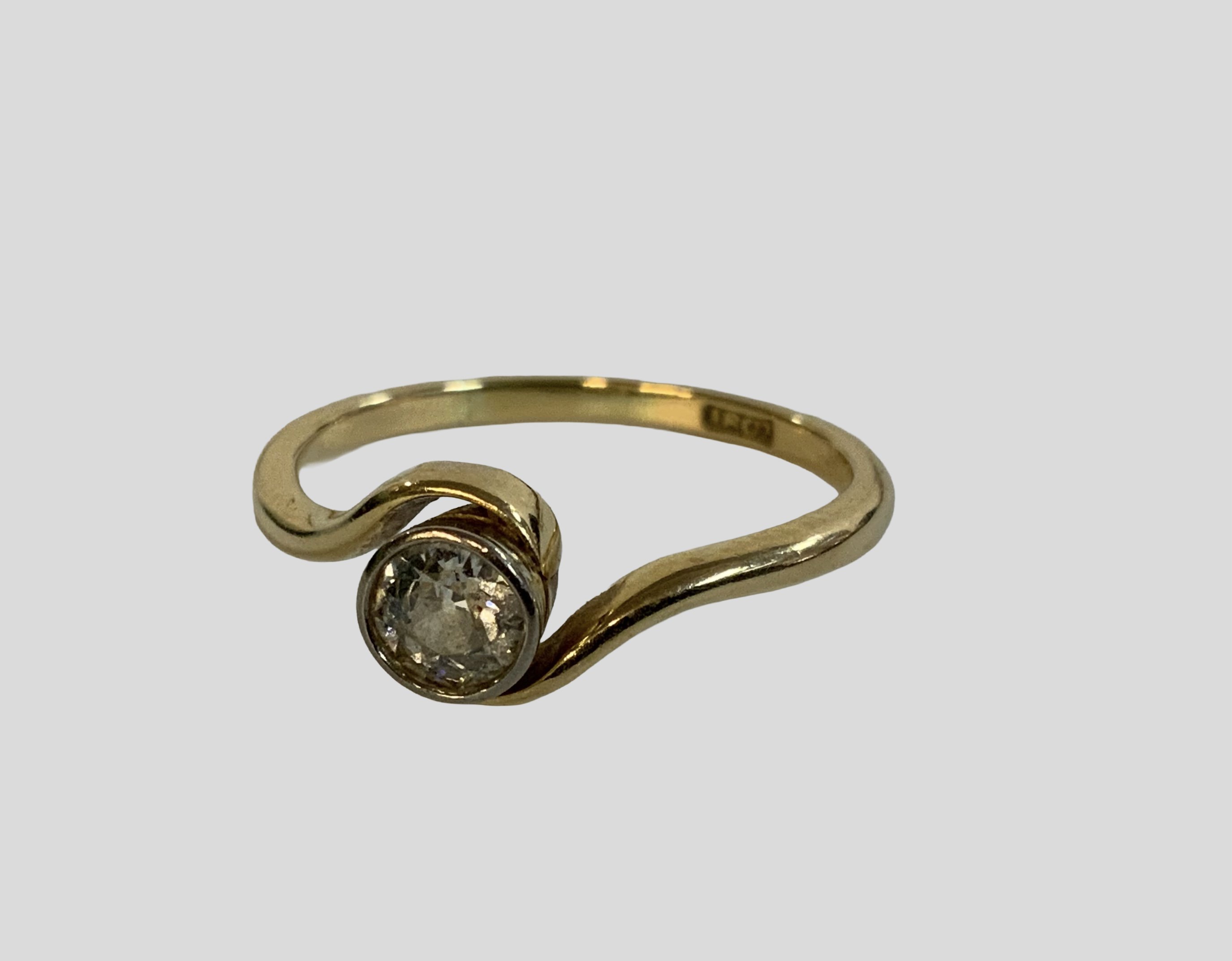 An 18ct gold twist design solitaire ring, 0.35ct, Size N. (A)