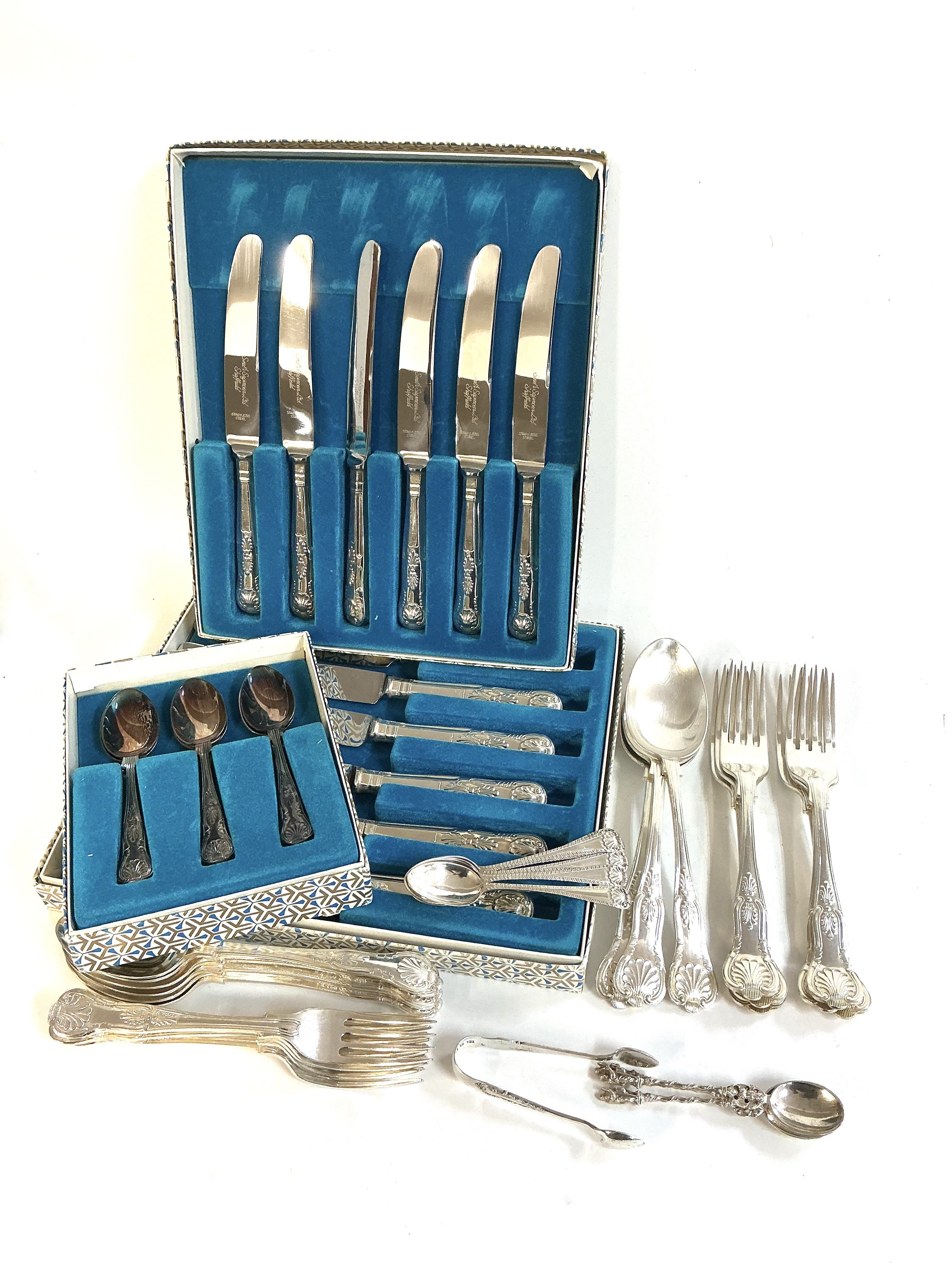 A collection of EPNS together with some hallmarked silver cutlery items.