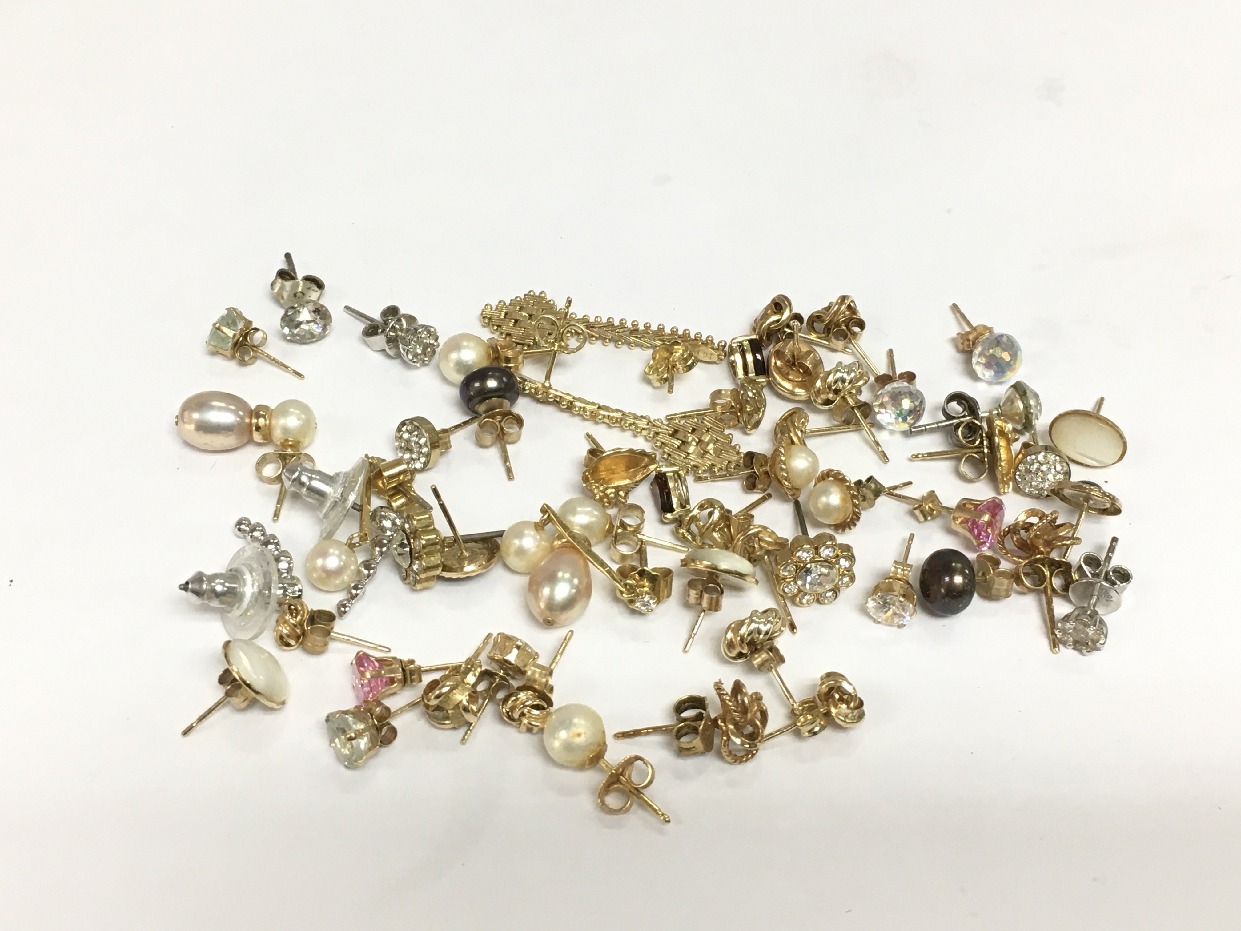 A collection of earrings including gold examples, approx total weight 27g. Shipping category A.