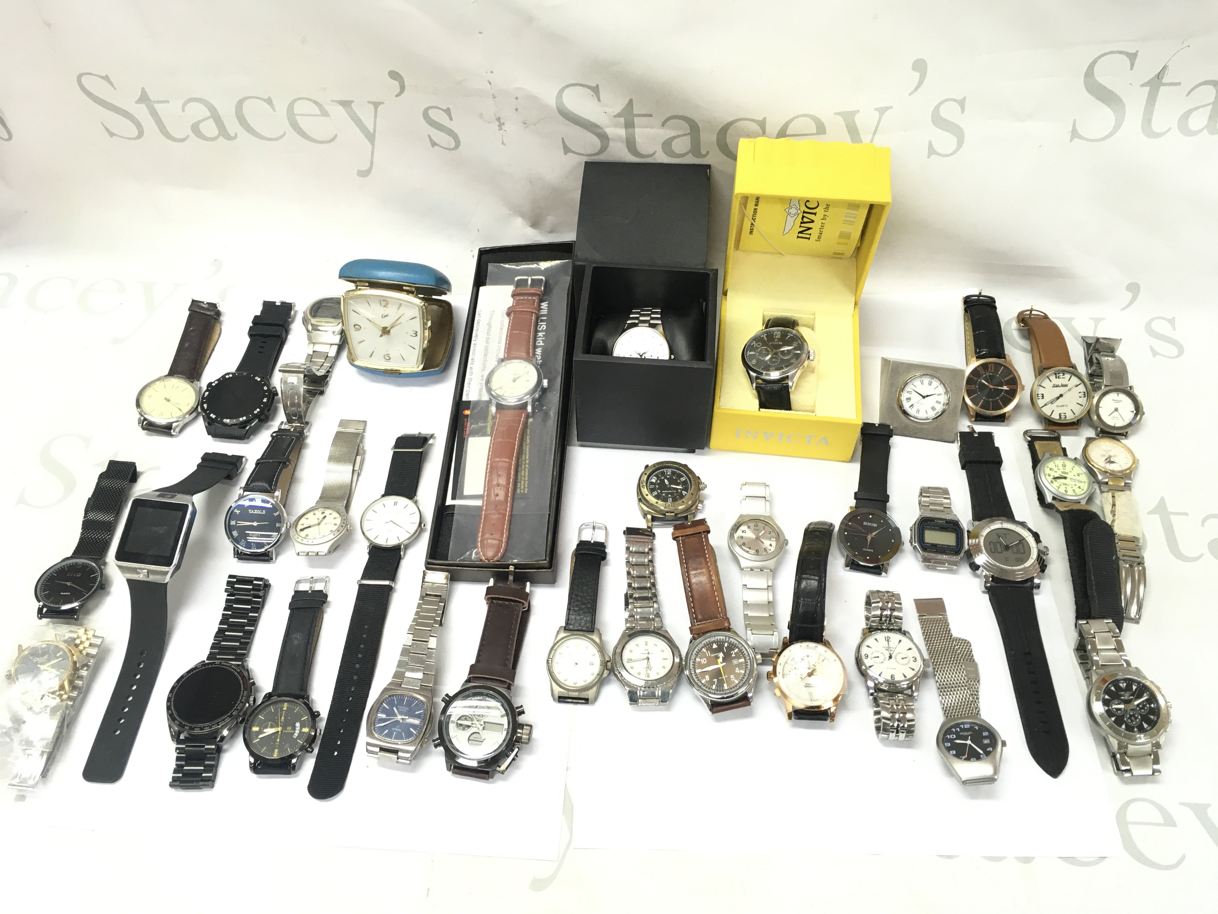 A collection of assorted watches including storm Casio etc.