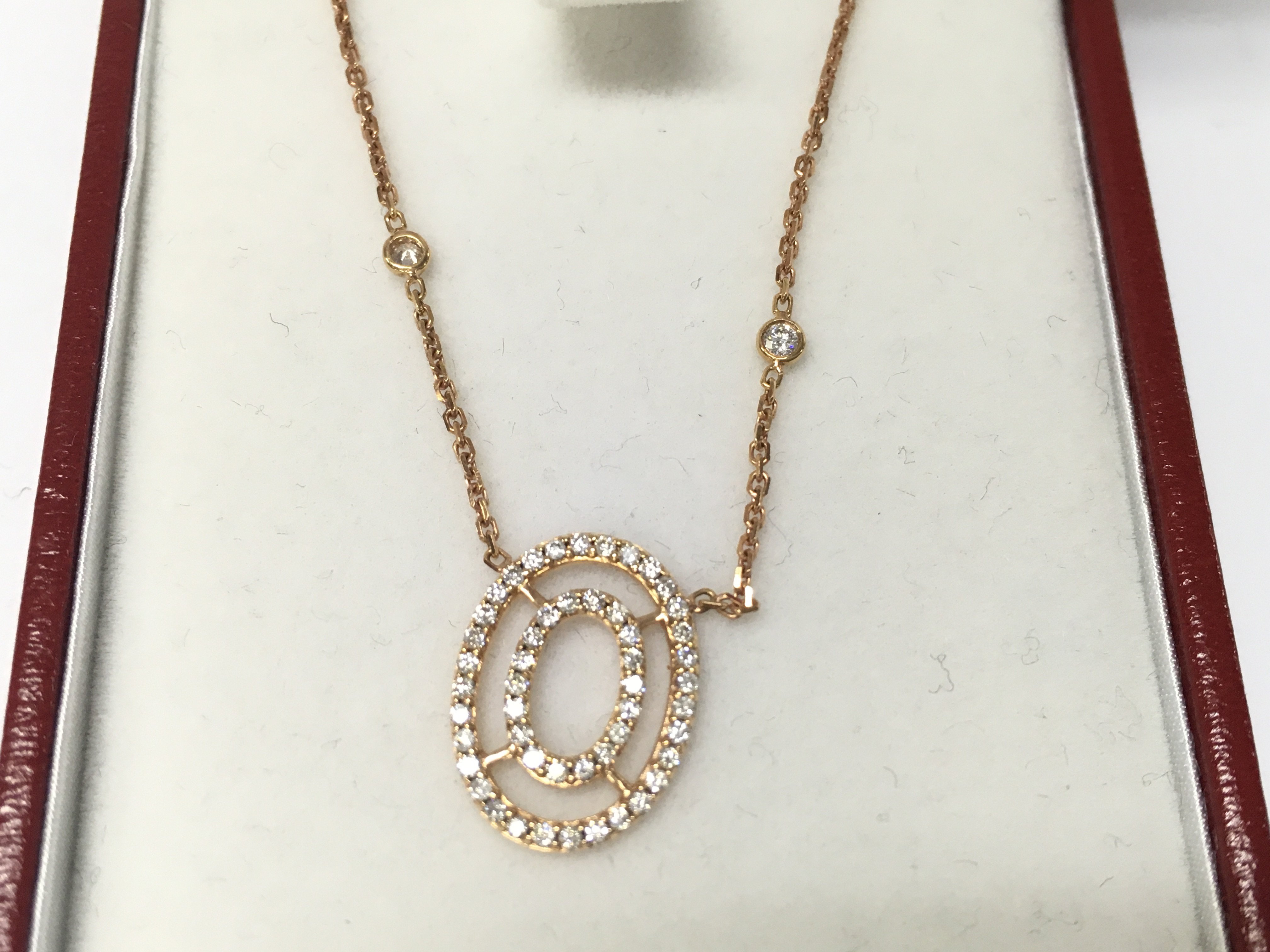 18ct rose gold circle necklace. Postage B