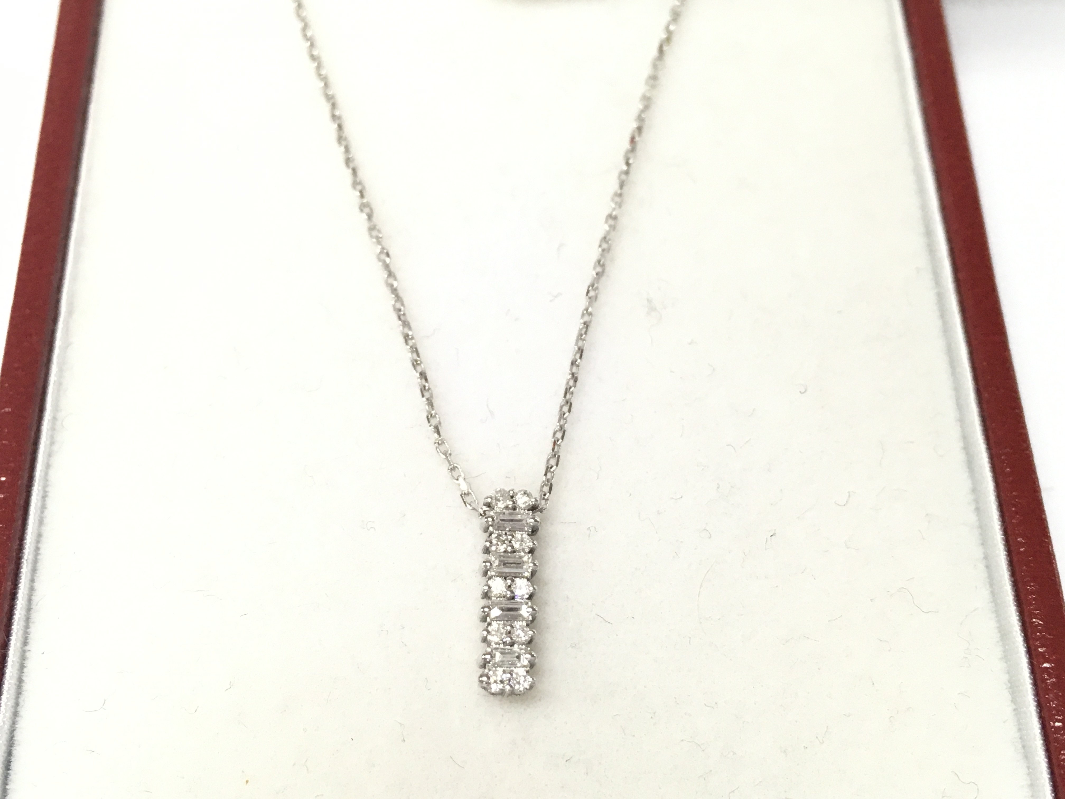 14ct white gold diamond line necklace.
