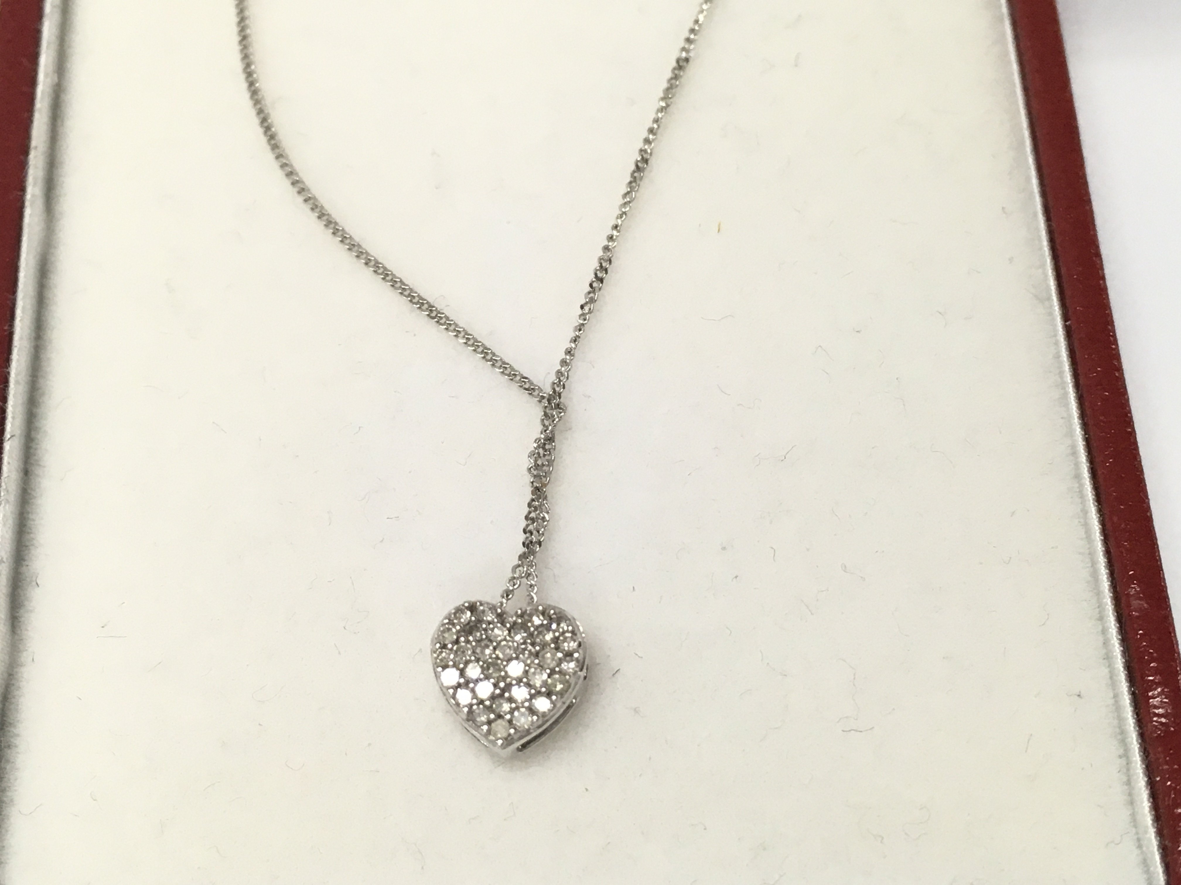 9ct white gold diamond pendant and chain.