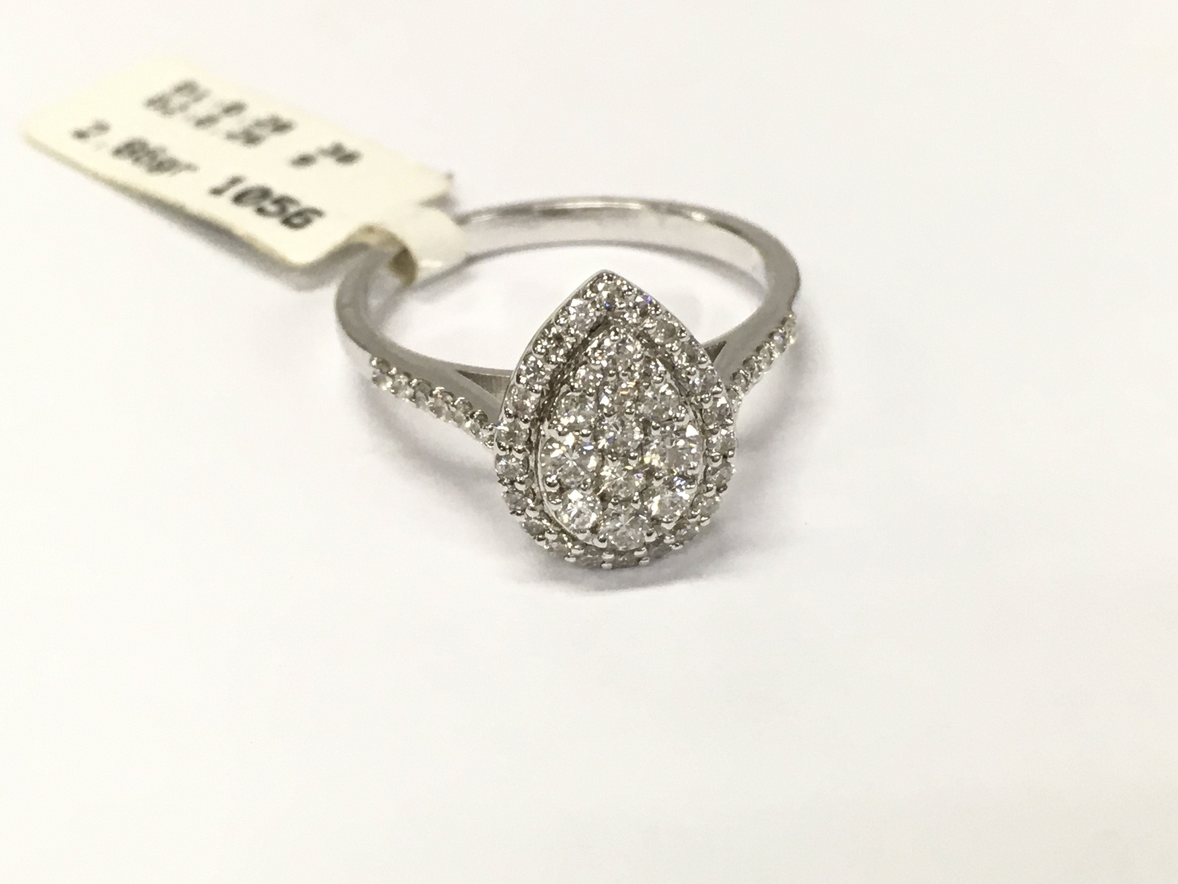 14ct white gold diamond drop cluster ring. Size M 1/2