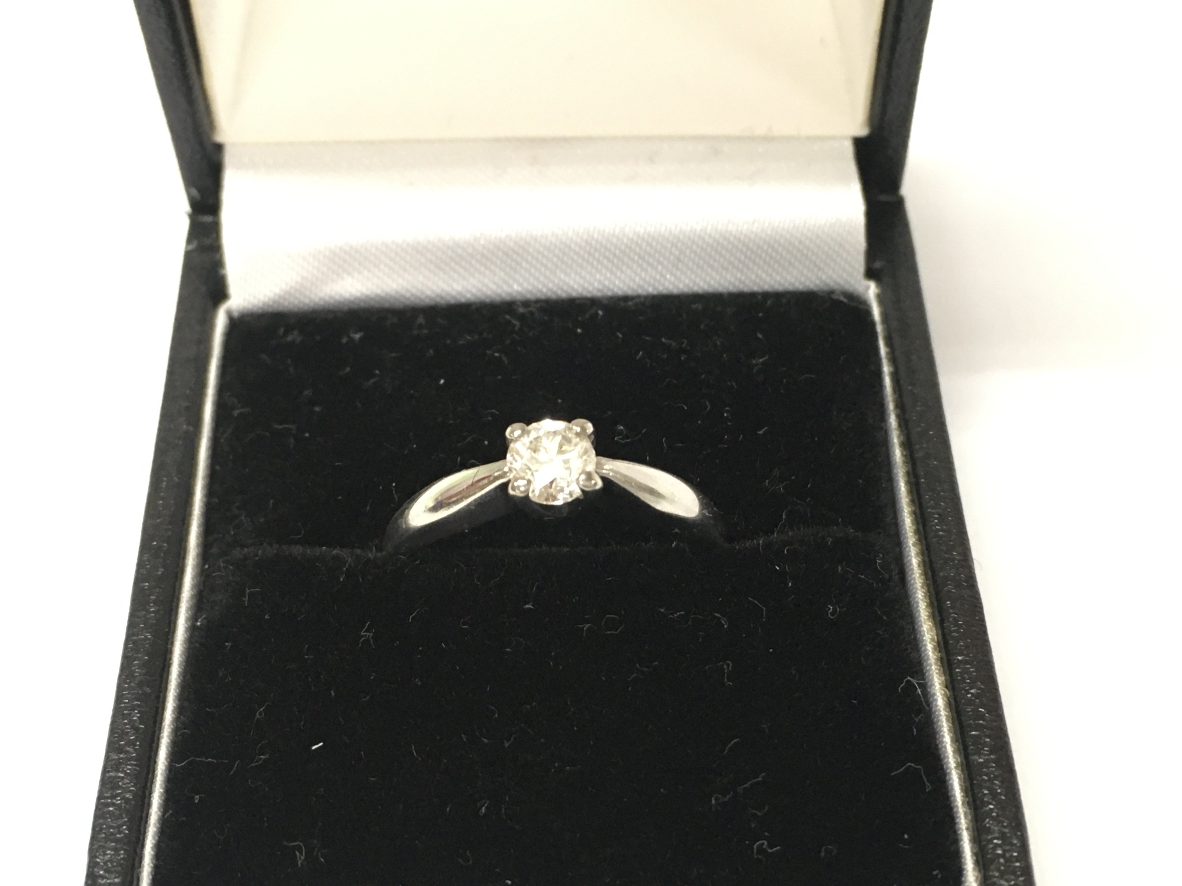 18ct white gold diamond solitaire ring.