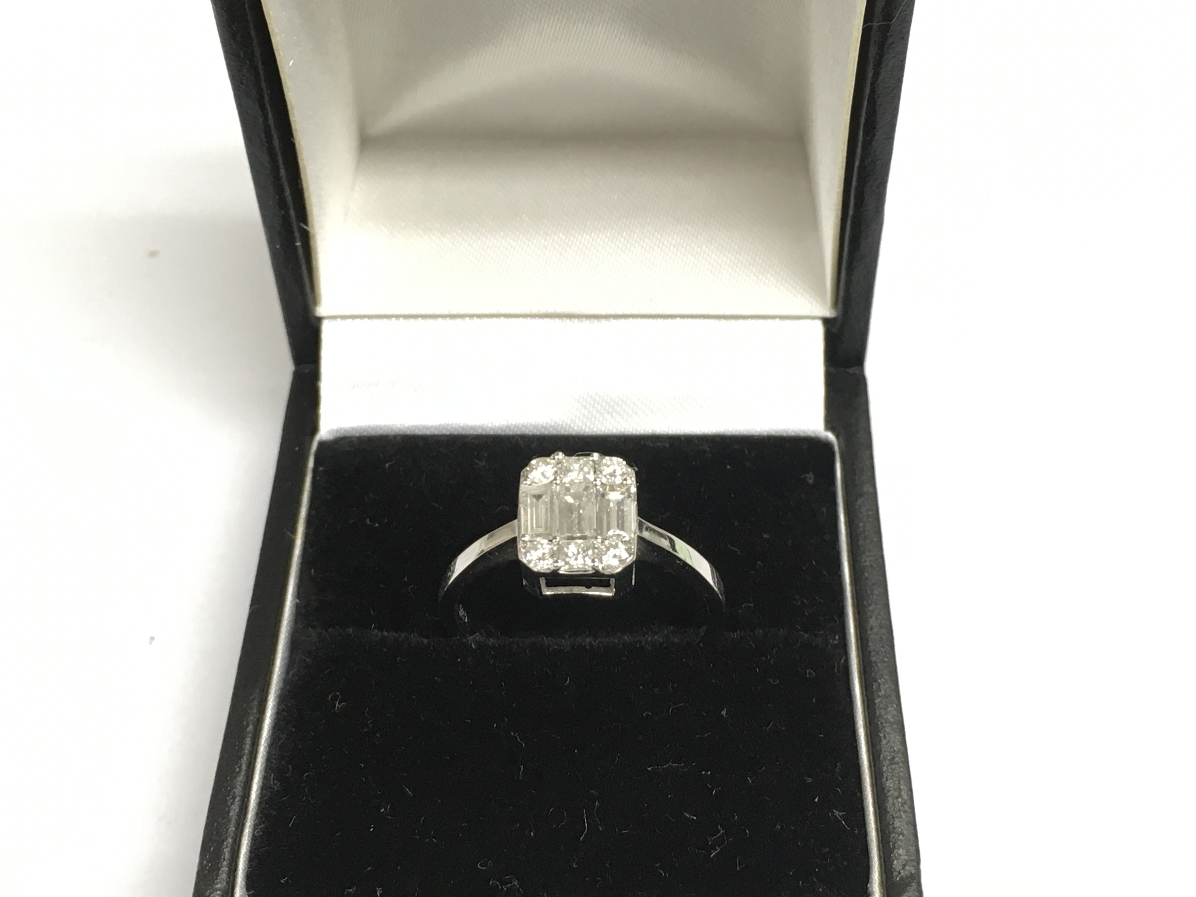 A 14ct white gold solitaire diamond ring, approx 2.2g and approx size M-N. Shipping category A.