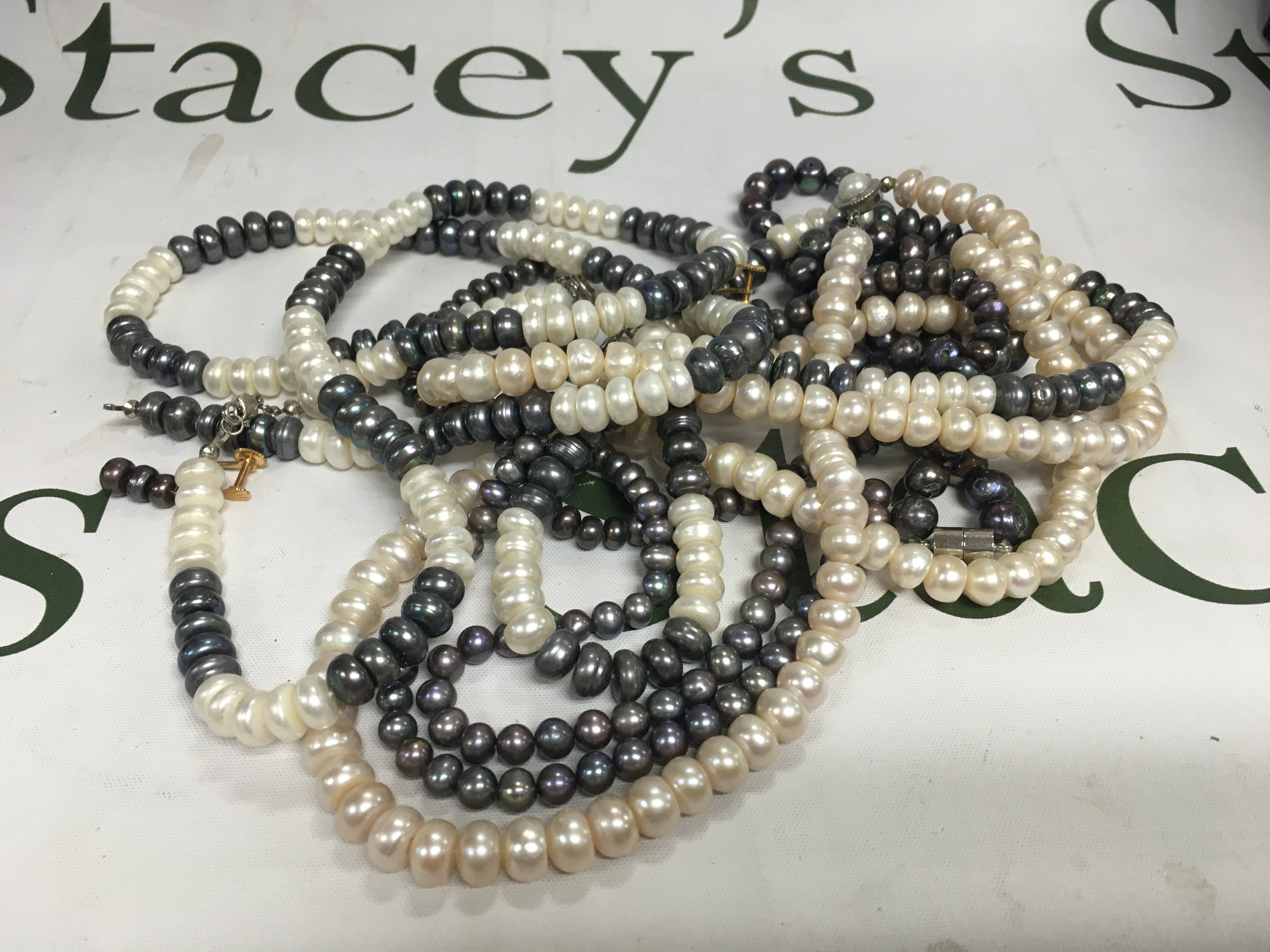 A mixed lot of cultured Pearl jewellery including earring and necklaces.