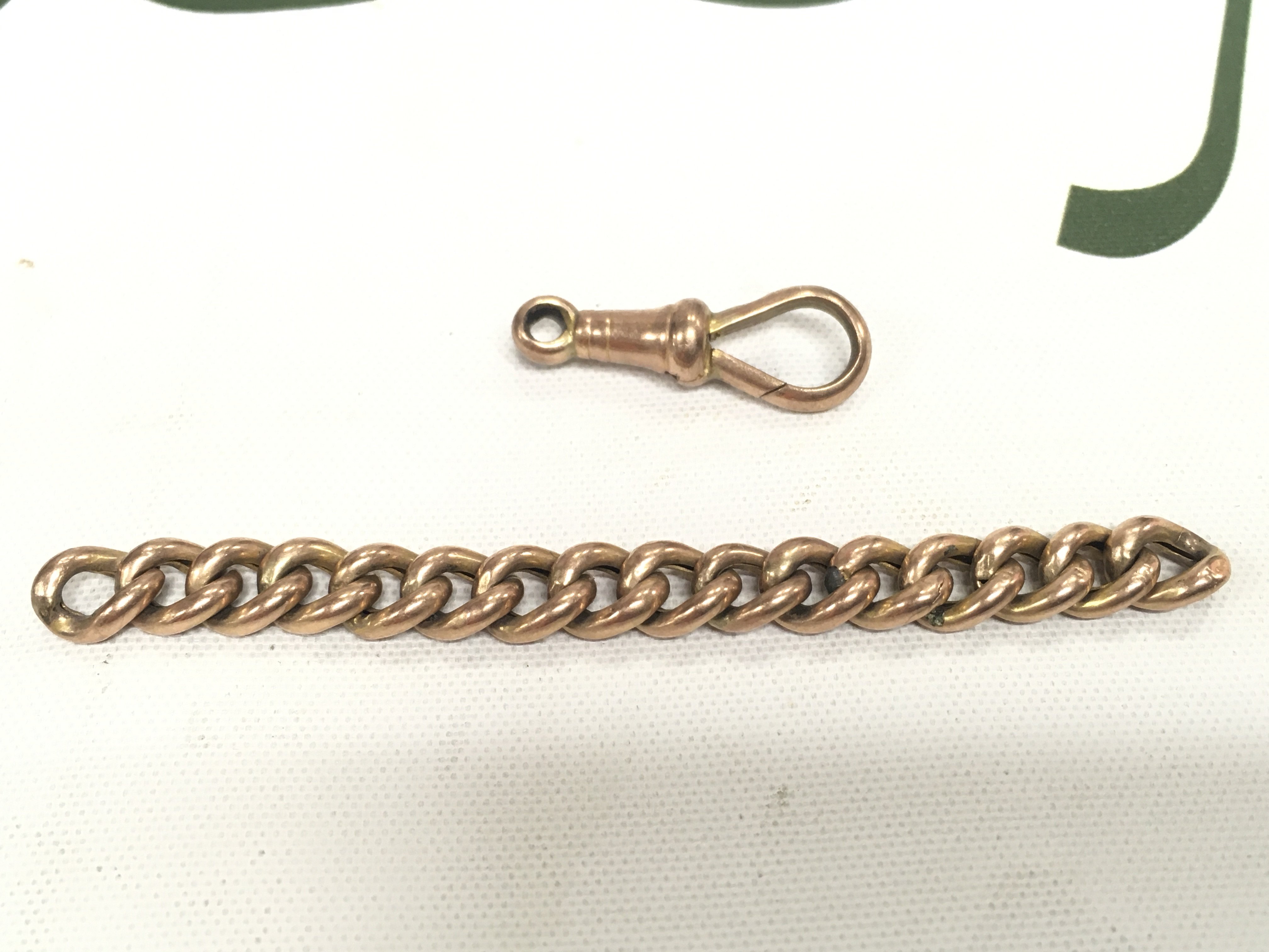 3&#2013266057۝ of 9ct gold Albert chain and a swivel clasp. Approx weight 5.62 grams.
