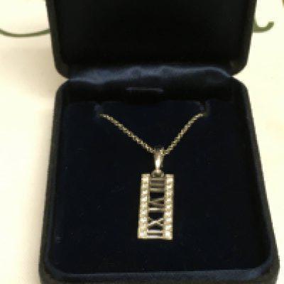 A boxed 18ct white gold Tiffany necklace. Shipping category A.
