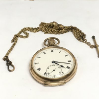 A 9ct gold cased pocket watch with chain. Shipping category A.