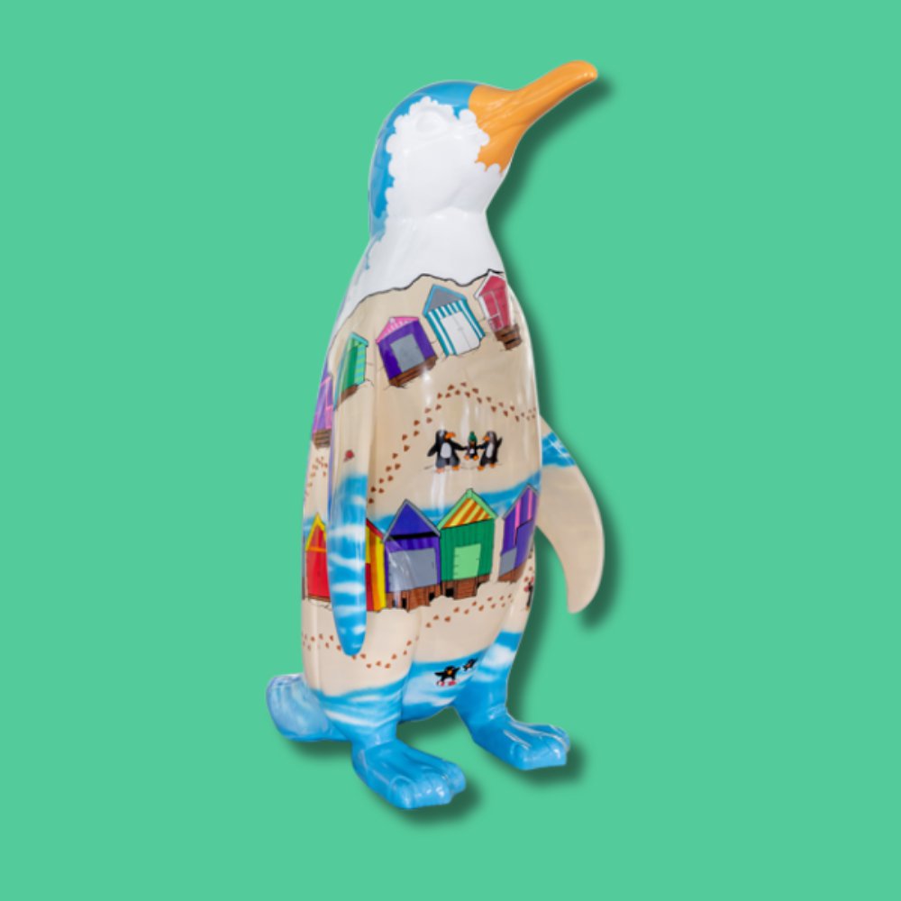 "Oh! I Do Like To Waddle Besides The Seaside!" - Sponsor: Silver City Estates / Artist: Craig Hallums / This design presents a small narrative following the footsteps of a single penguin as they 'Waddle - on- Sea'. It's a playful, small-scale mirror of the wider trail as you find the various penguins throughout. The spiralling design draws the viewer around the full 3-dimensionality of the statue. Craig Hallums is an illustrator from Southend-on-Sea known for intricate pen and ink drawings. He recently adapted his distinctive style for larger murals, including work at Southend City Jam. A two-time finalist in the Southend Portrait Artist competition, Craig is a member of the 70 The Broadway Gallery and Collective and has contributed officially licenced artwork to various trading card companies, on properties such as Marvel and Star Wars. - Height 1600mm width 890mm Depth 1090mm weight 30kg