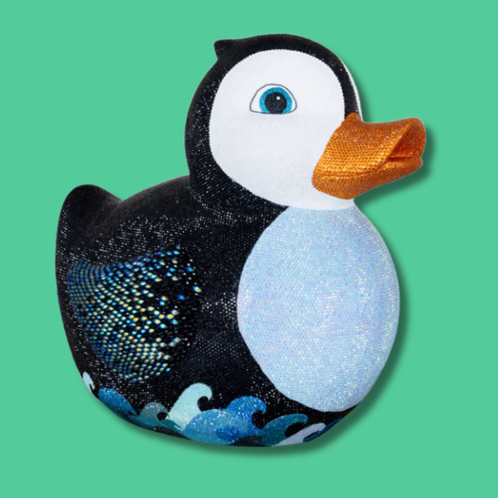 Quacky Feet (SMALL SCULPTURE) - Artist: Sarah Nash / Quacky Feet is an adventurous little rubber duck who loves Happy Feet the movie. He wanted to find a waddle and see if he could disguise himself as a penguin to join in the fun. Luckily he found a fantastic waddle in his home town so he didn't have far to travel. Can you find him? Height 620mm, Width 480mm, Depth 700mm