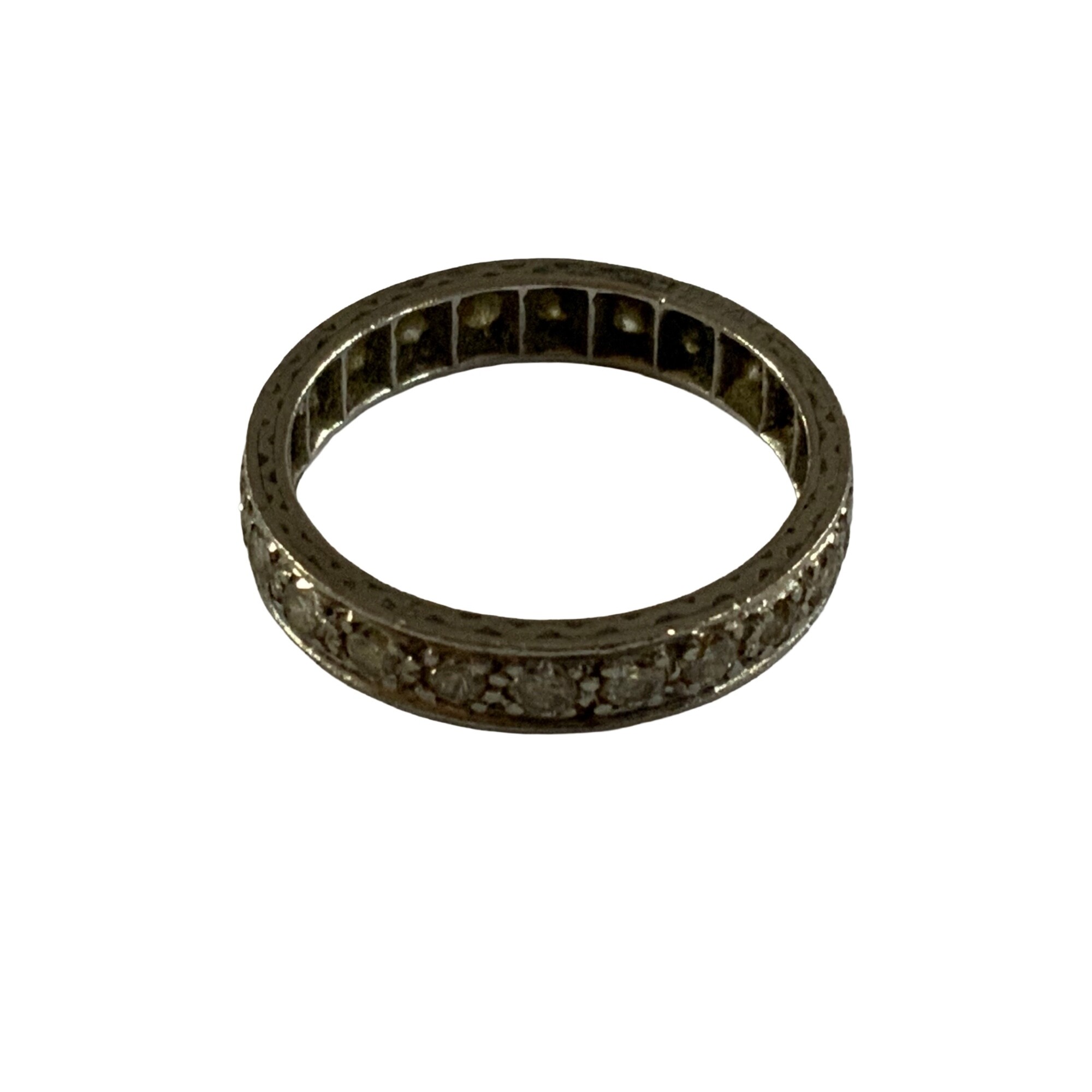 Platinum full eternity ring set with small Moissonite stones  , size K. 3.2g total weight.