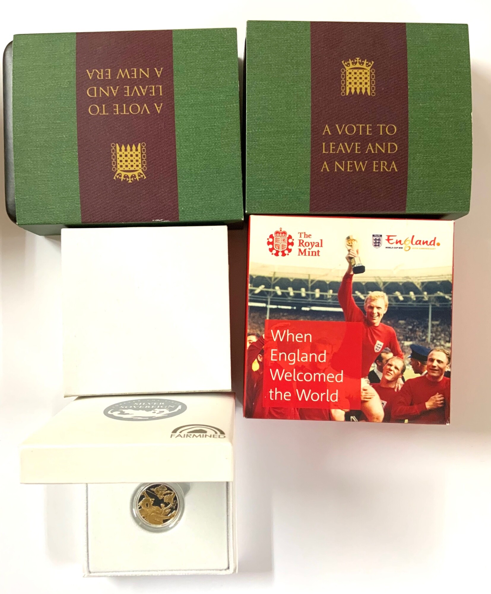 2 Royal Mint commemorative silver proof 50ps, 1996 £5 silver proof coin,  2 silver sovereigns.