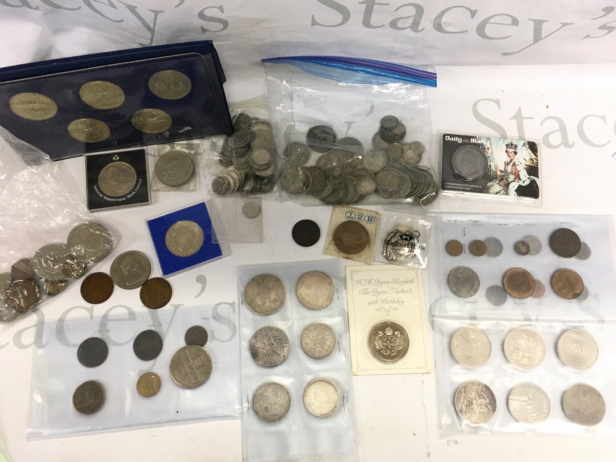 A mixed lot of British and world coinage including some pre 1947 coinage