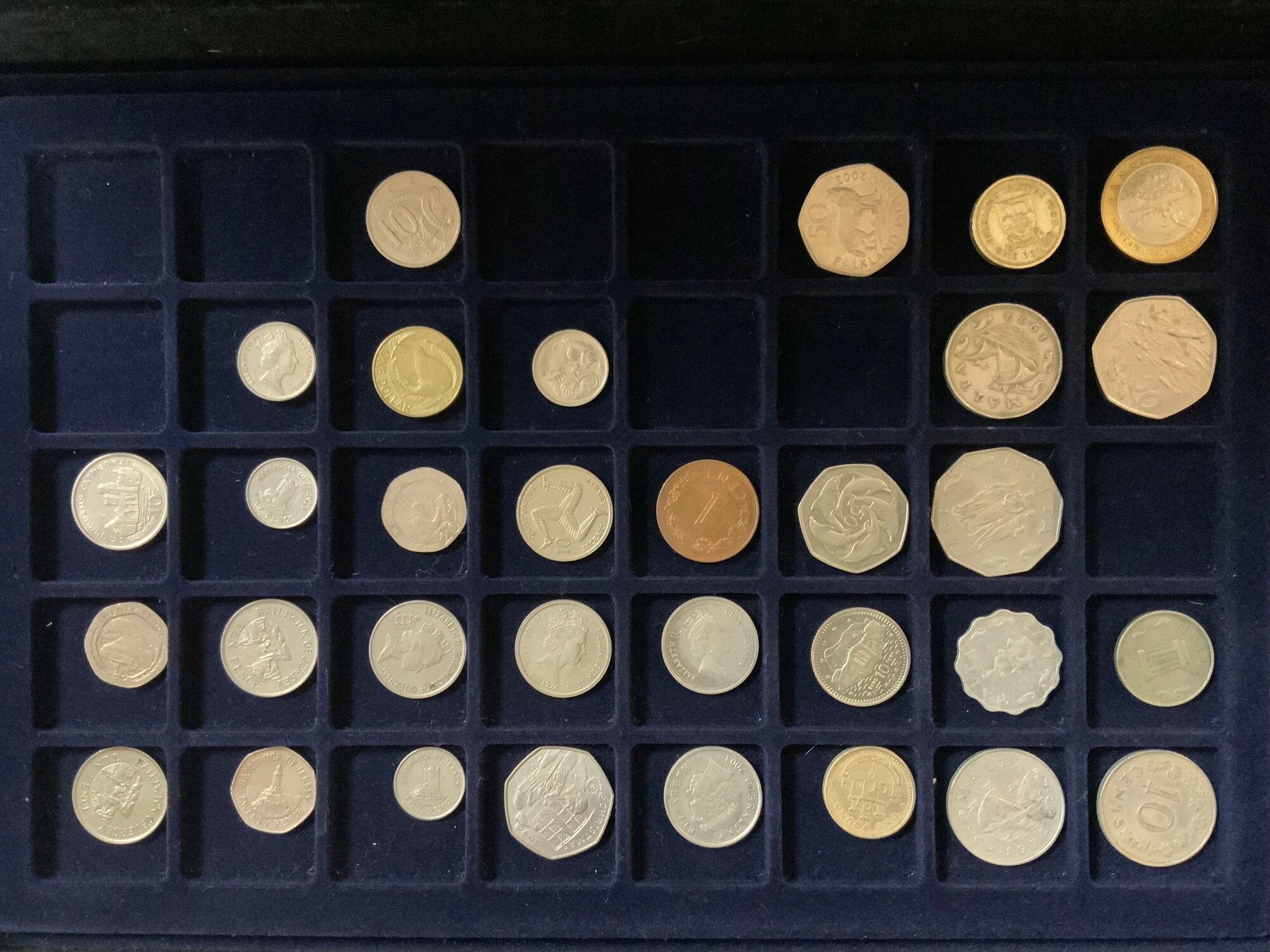 A collection of British, commonwealth and and world coinage.