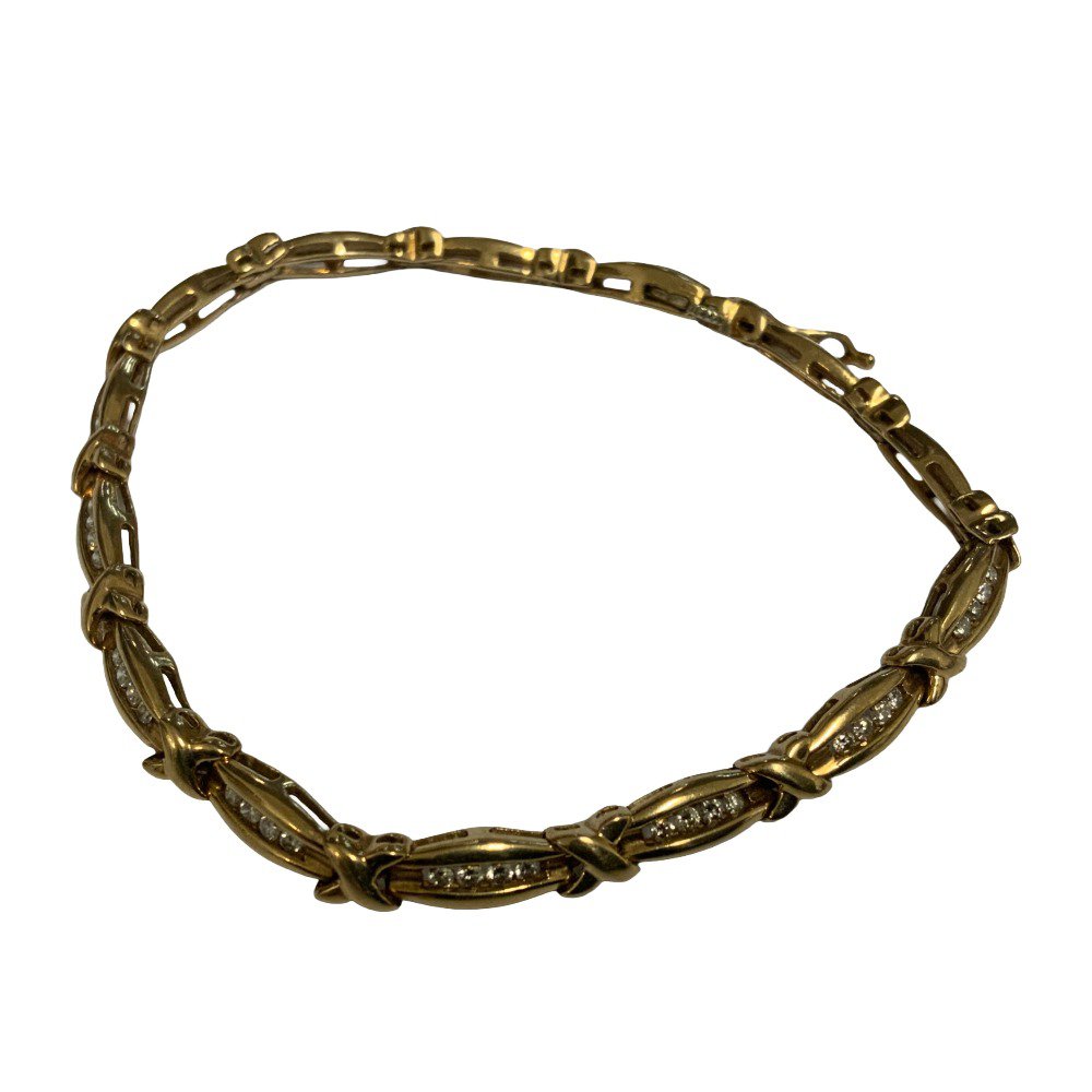 A 9ct gold diamond set bracelet, 9.8g