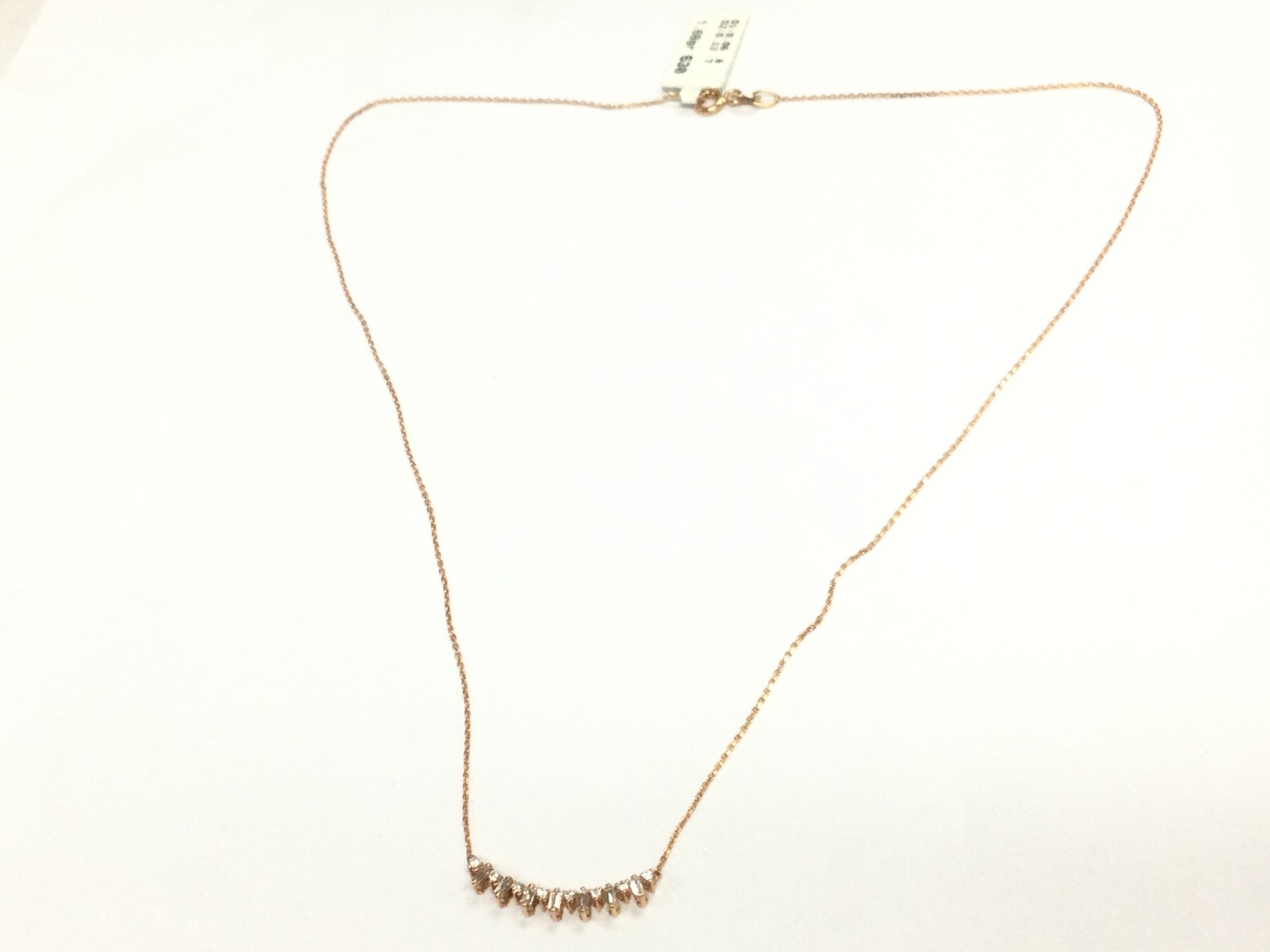 A 14ct rose gold necklace set with diamonds, 1.4g total weight approximately.