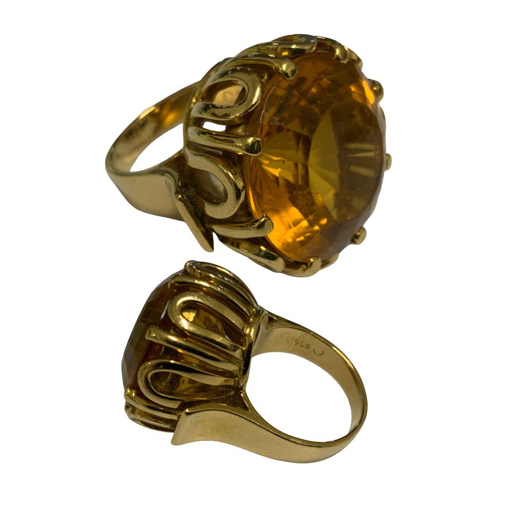 A large and impressive 18ct yellow gold and large faceted citrine ring, 20.96g, Size M.5.