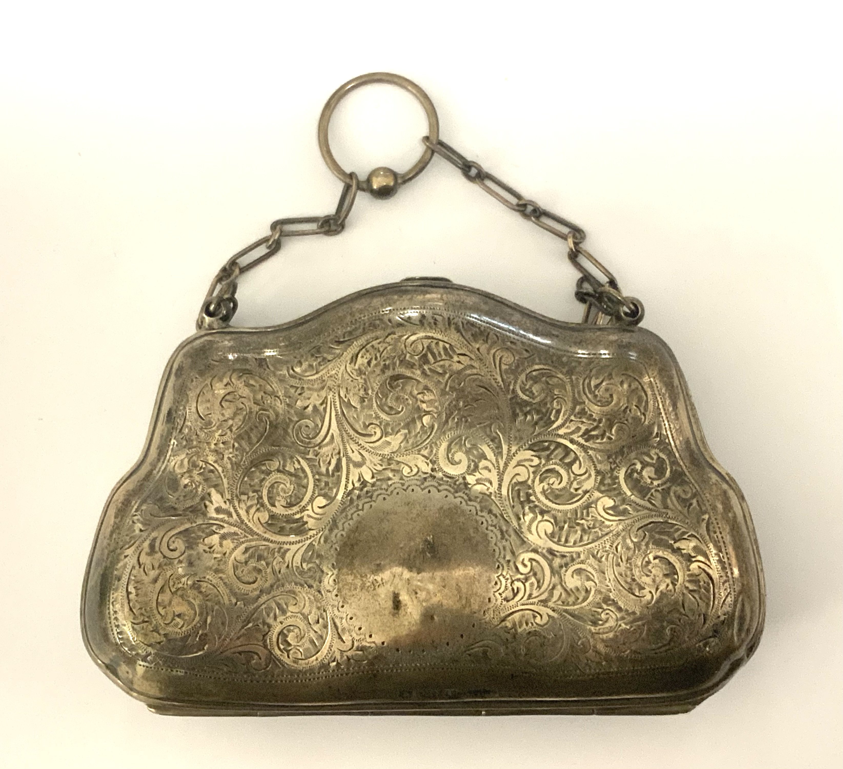 An Edwardian hallmarked silver purse. 123g.