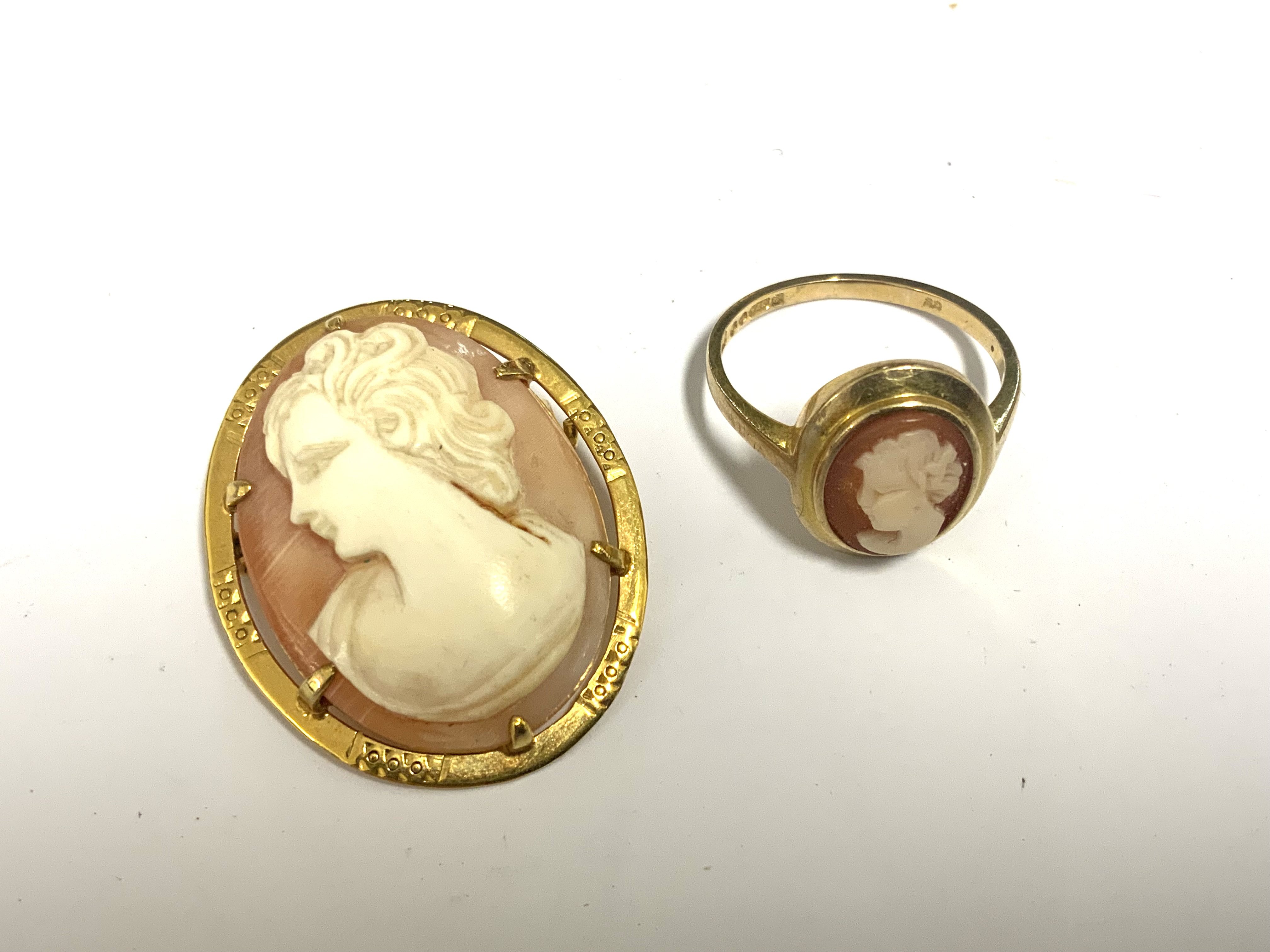 A 9ct gold mounted cameo brooch and conforming ring. 