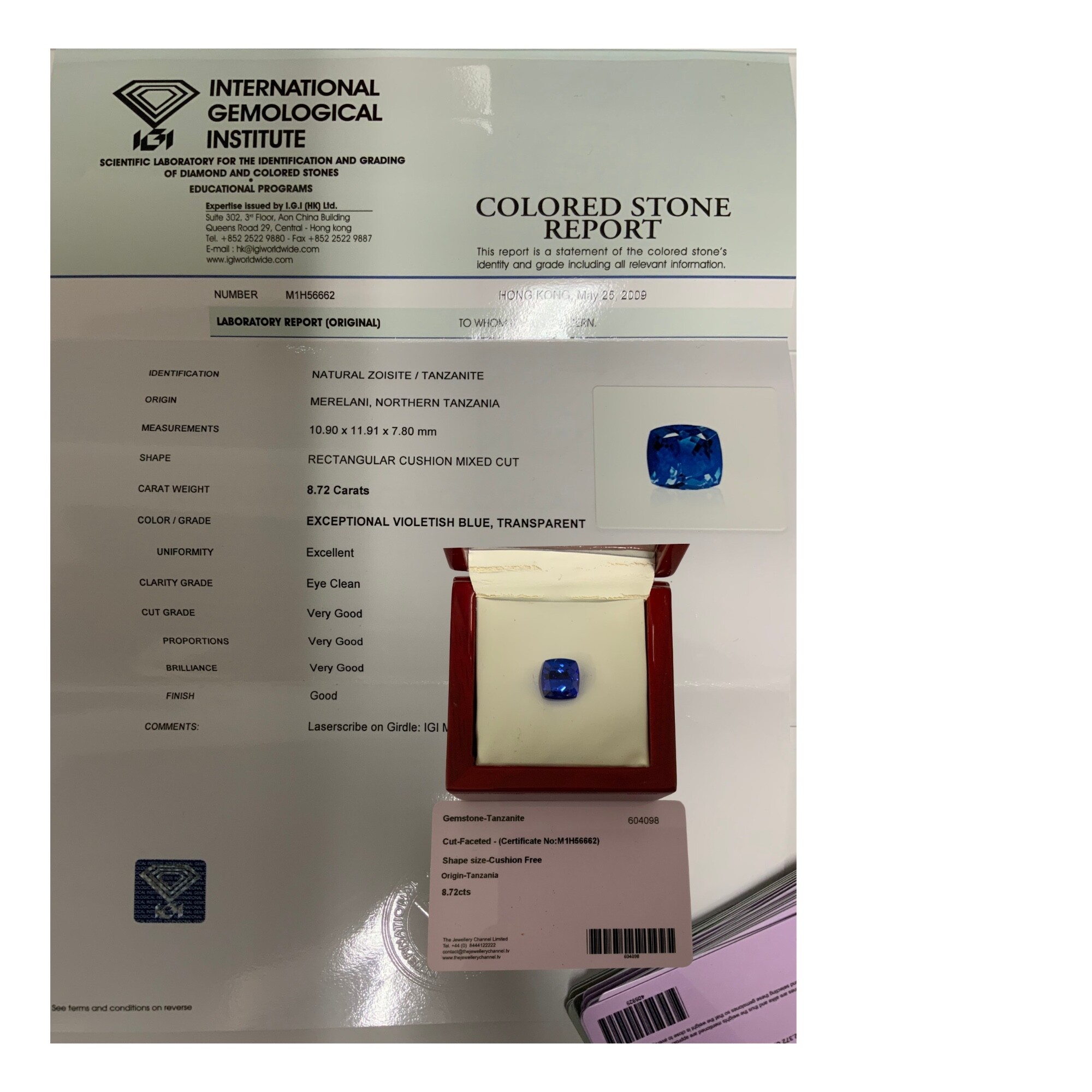 An 8.72ct cushion cut faceted tanzanite, untreated, Serial IGI M1H56662 laser inscription.