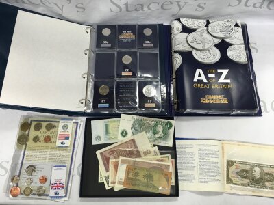 An assortment of change checker coins including the complete 10p A-Z set and various bank notes