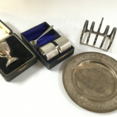 Silver hallmarked items including a small dish, toast rack, napkin rings, small damaged egg cup- NO RESERVE