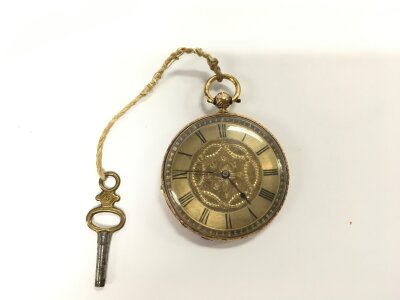 An unhallmarked high ct gold pocket watch. Winds and runs approximately 40mm case and 34g