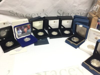 A Collection of Royal Mint Silver proof coins including The Royal Birth 2015 £5, 2007 Diamond Wedding crown, Sapphire Jubilee of her majesty £5, 2008 Queen Elizabeth I £5, 2010 Restoration of the monarchy £5, Queens Diamond Jubilee £5, Royal Wedding 2011 £5, Diamond Jubilee 2012 £5