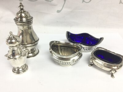 Silver hallmarked items-  two pepper pots , three salt dishes two with blue liners