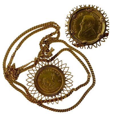 A 1975 Full 1oz Kruggerand coin with a 9ct gold sunflower design coin mount, with a heavy 9ct gold chain, 92cm.