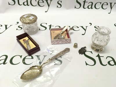 Silver articles in box including cutlery a jar etc