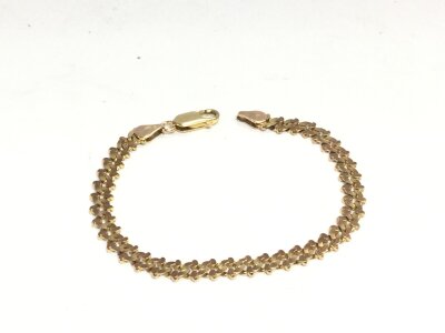 A 9ct gold bracelet. 8.83g