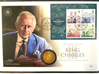 A King Charles III gold presentation coin cover, Coronation issue, 31.21g, 24ct Gold, Proof finish.