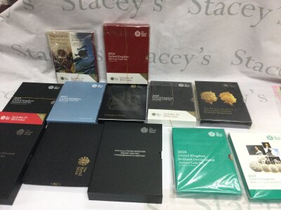 12 x United Kingdom coin sets including proof sets from various years.
