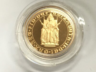 An 1989 full gold sovereign featuring the 500th anniversary design.