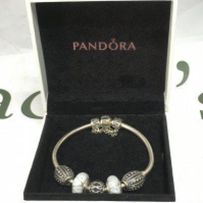 A Pandora bracelet in a fitted box. NO RESERVE