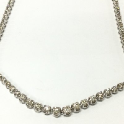 A 9ct white gold diamond graduated necklace set with approximately 10.40ct total. 43cm length