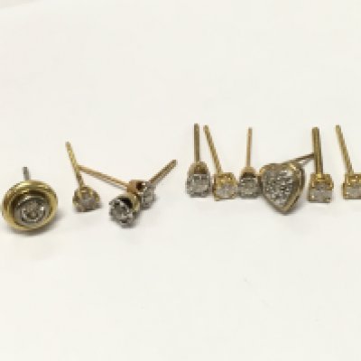 Unmarked high carat Gold earrings set with Moissanite and diamond stones ,4.5g total weight