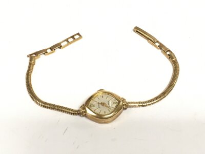 A 9ct gold cased ladies watch.