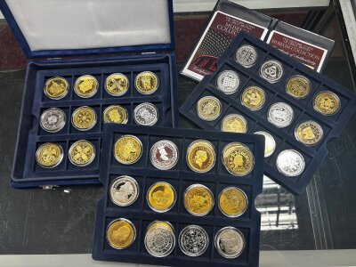 A case of Westminster mint Museum collection replica coinage. Cupro nickel coinage.