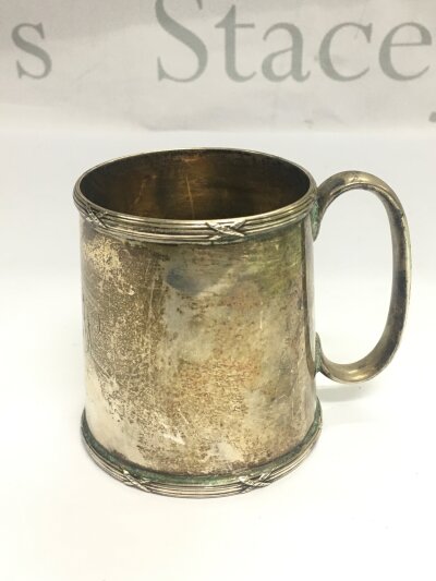 A silver mug, Sheffield 1926, approx height 8cm.