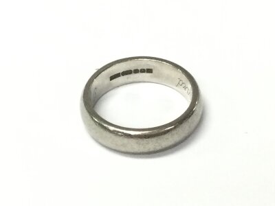 A palladium wedding band. Size L and 5.27g