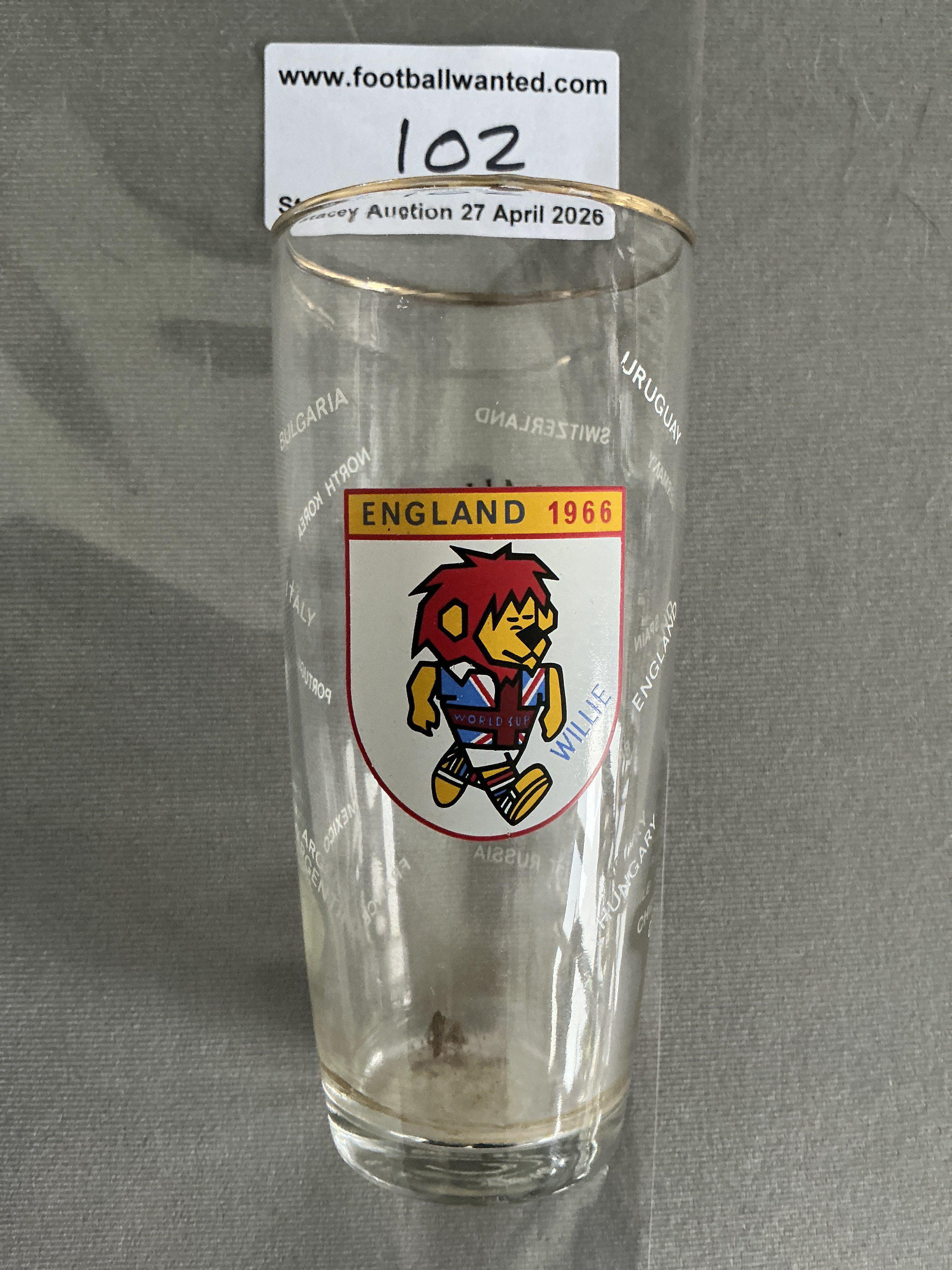 1966 World Cup German Beer Glass: Dortmunder Union Bier glass has World Cup Willie to one side, beer brand to the other and the participating teams etched to glass. Probable half pint glass. 